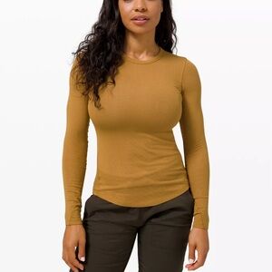 Lululemon Hold Tight Ribbed Long Sleeve Shirt
Bold Beige Brown Size Womens 8 EUC